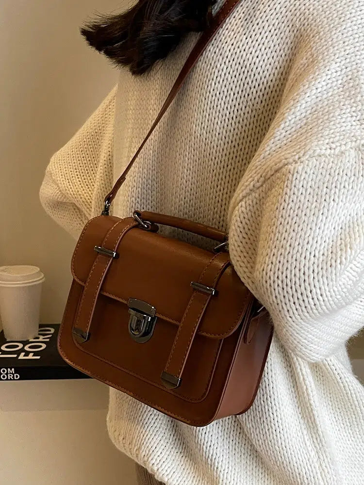 Compact Buckled Crossbody Bag