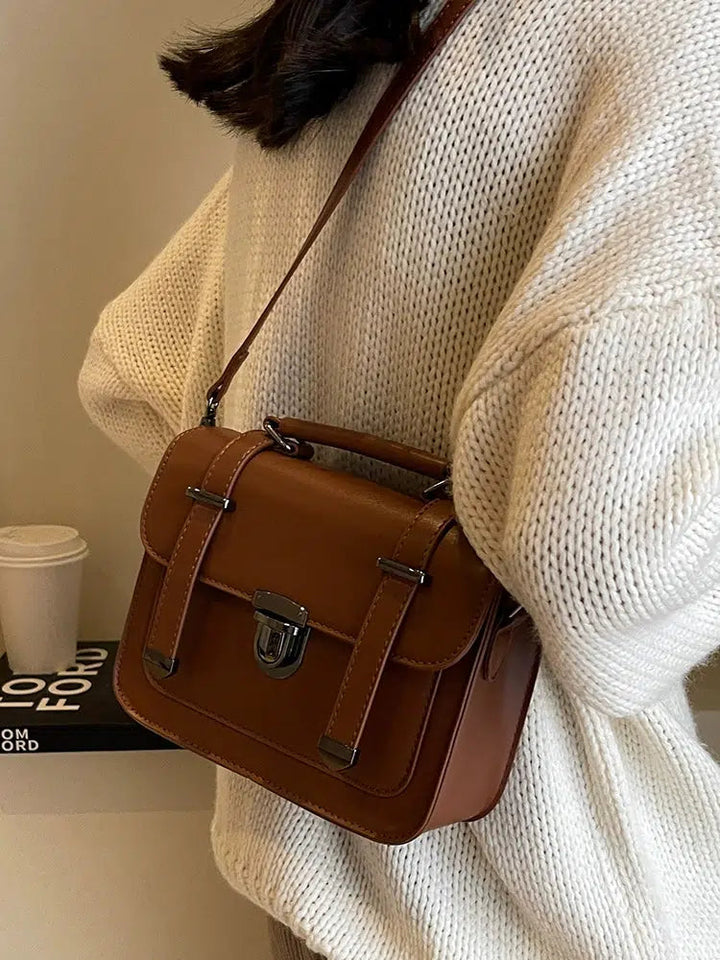 Compact Buckled Crossbody Bag