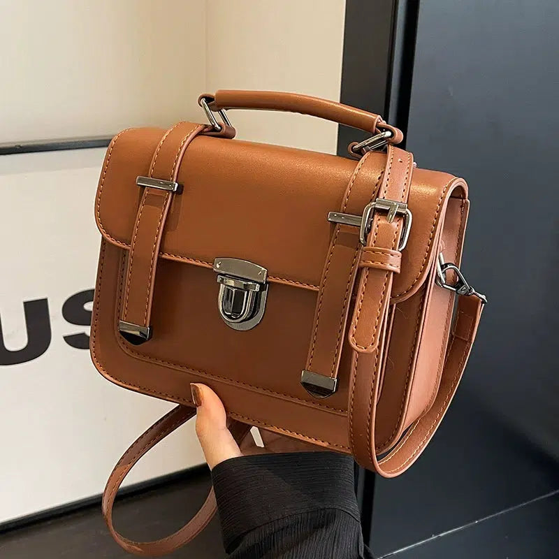 Compact Buckled Crossbody Bag