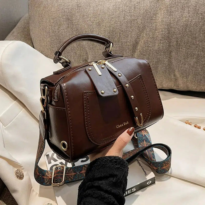 Embossed Strap Leather Handbag