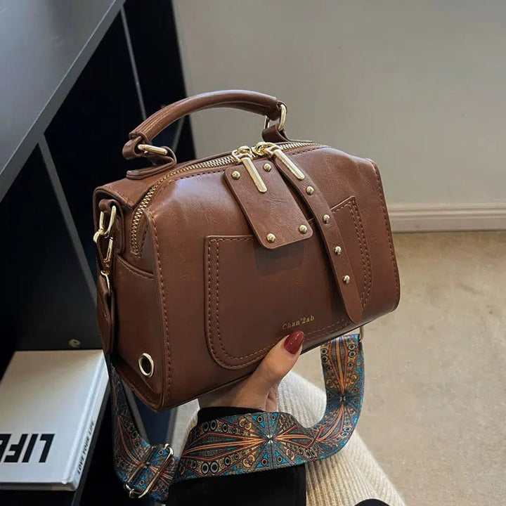 Embossed Strap Leather Handbag