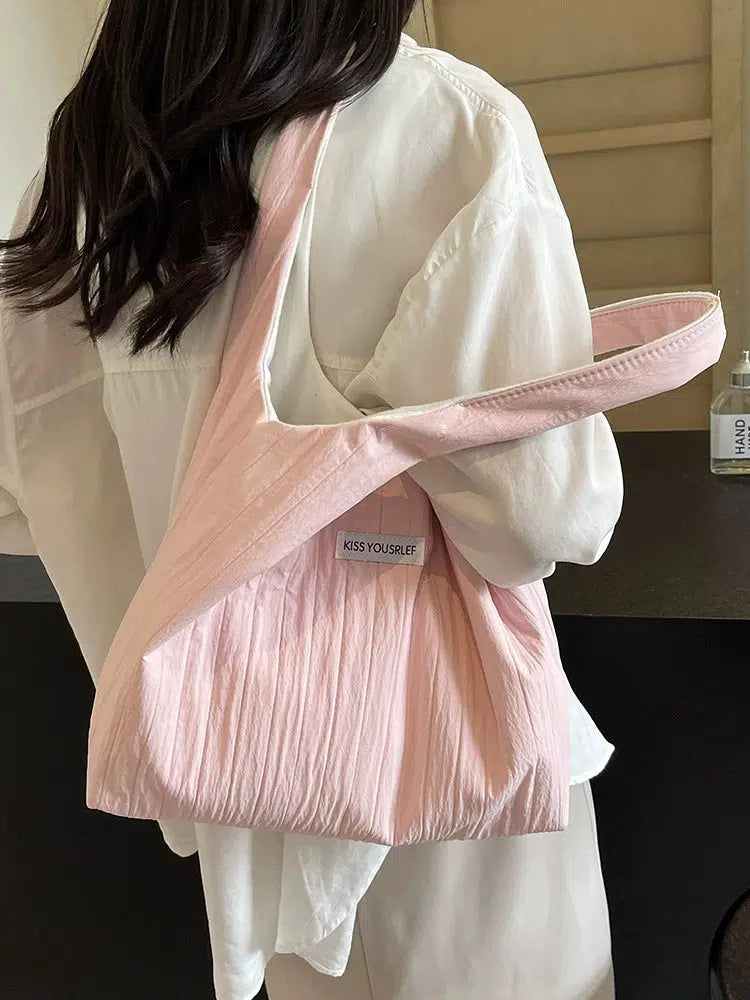 Inscription Quilted Tote Bag