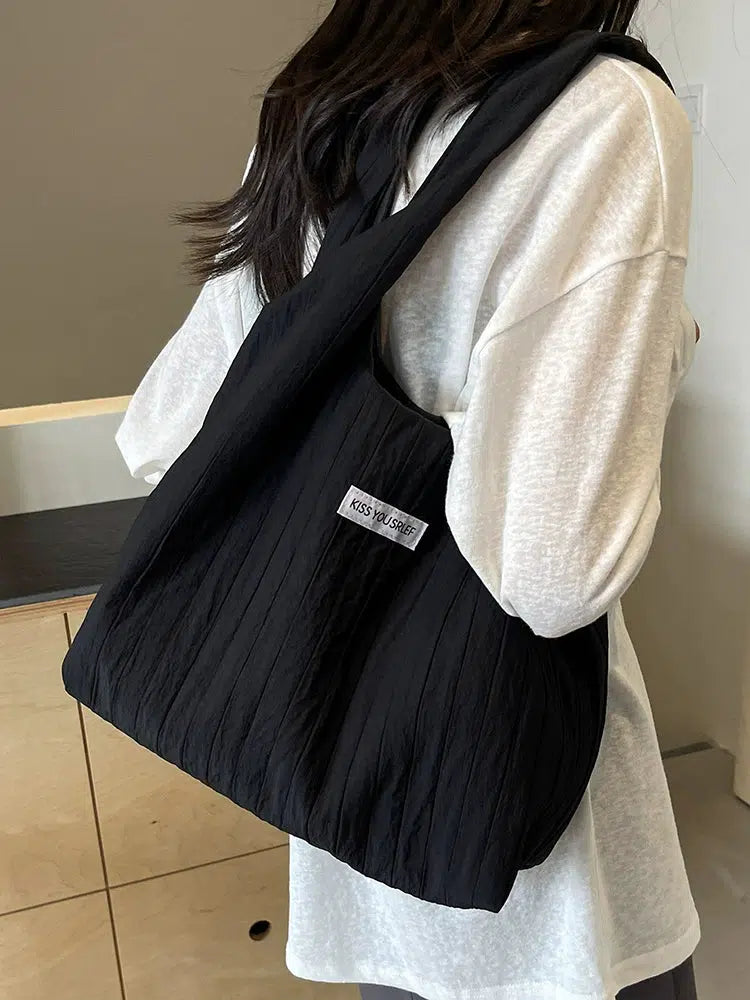 Inscription Quilted Tote Bag