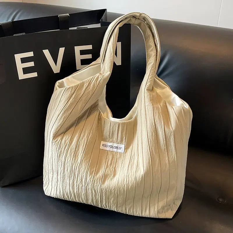 Inscription Quilted Tote Bag