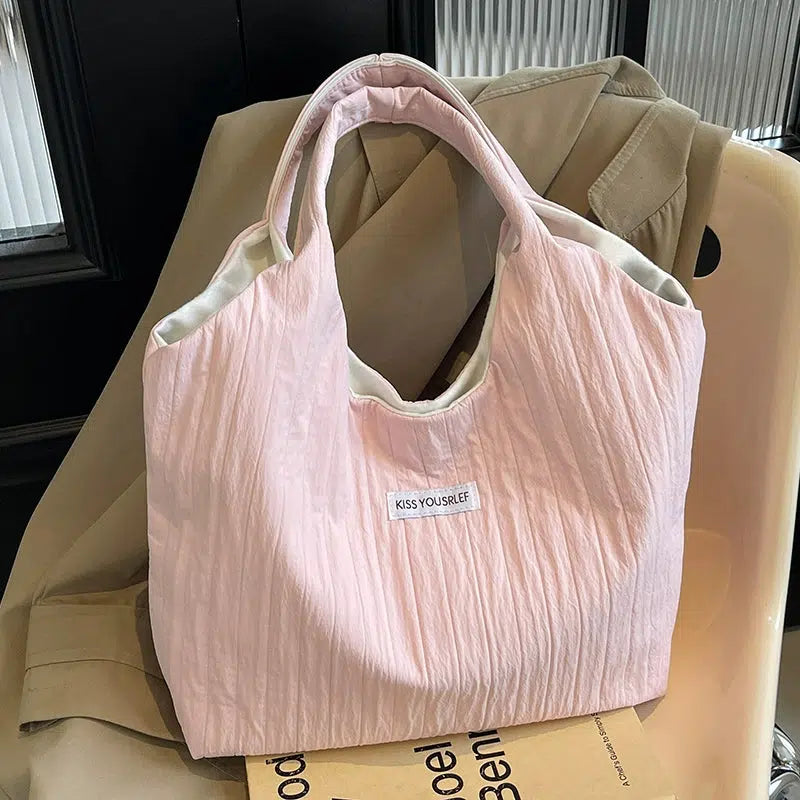 Inscription Quilted Tote Bag