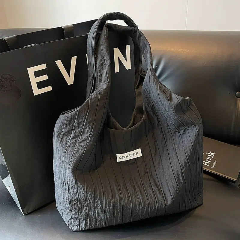 Inscription Quilted Tote Bag