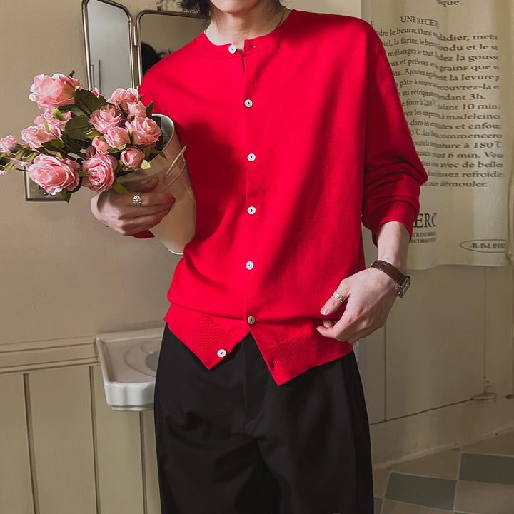 Pletený svetr s knoflíky a kulatým výstřihem