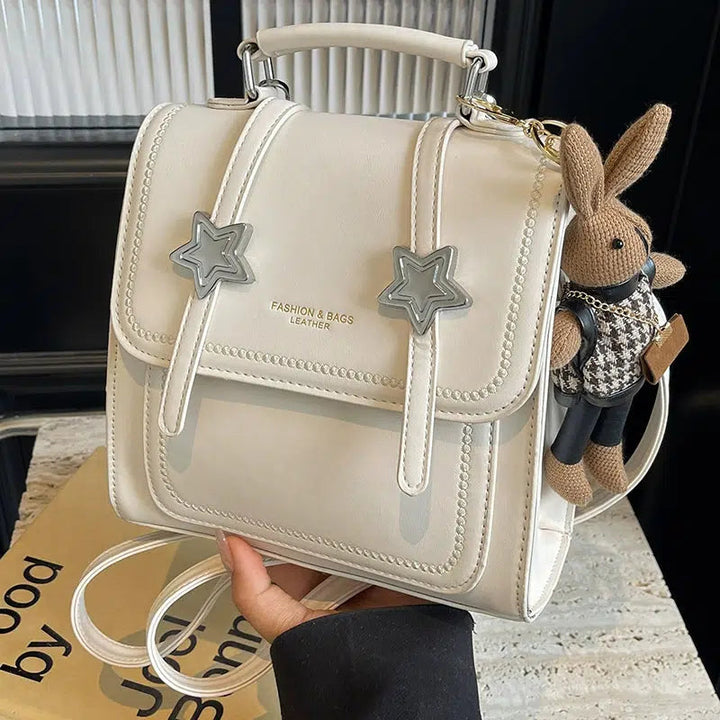 Star Accents Compact Leather Backpack