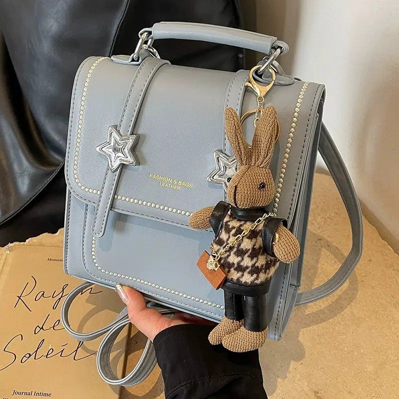 Star Accents Compact Leather Backpack