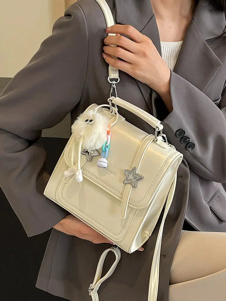 Star Charm Leather Backpack