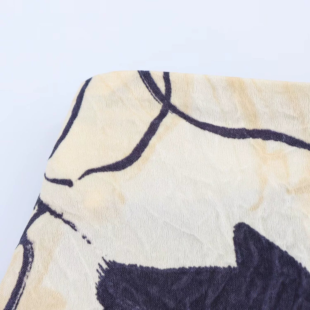 تنورة ميدي مطبوعة بالأزهار من الساتان