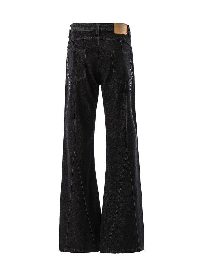 Teksturerede broderede rå denim flared bukser