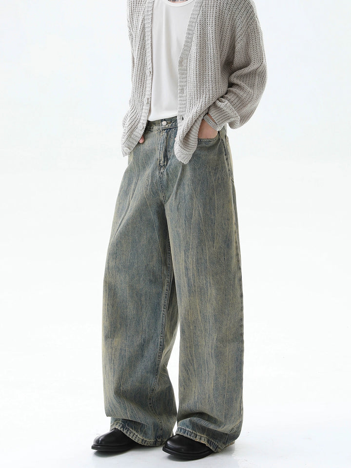 Jeans de pierna ancha con rayas verticales desgastadas