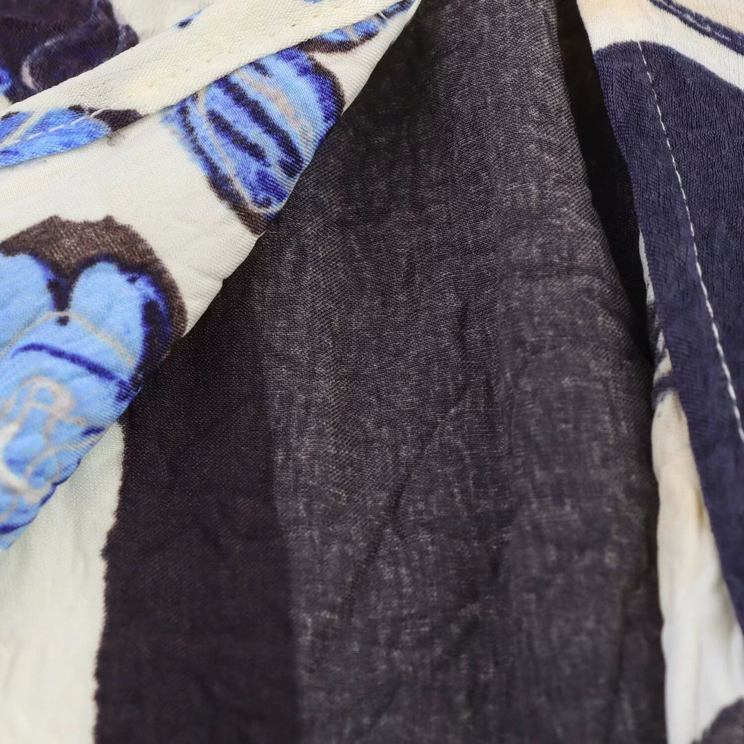 تنورة ميدي مطبوعة بالأزهار من الساتان