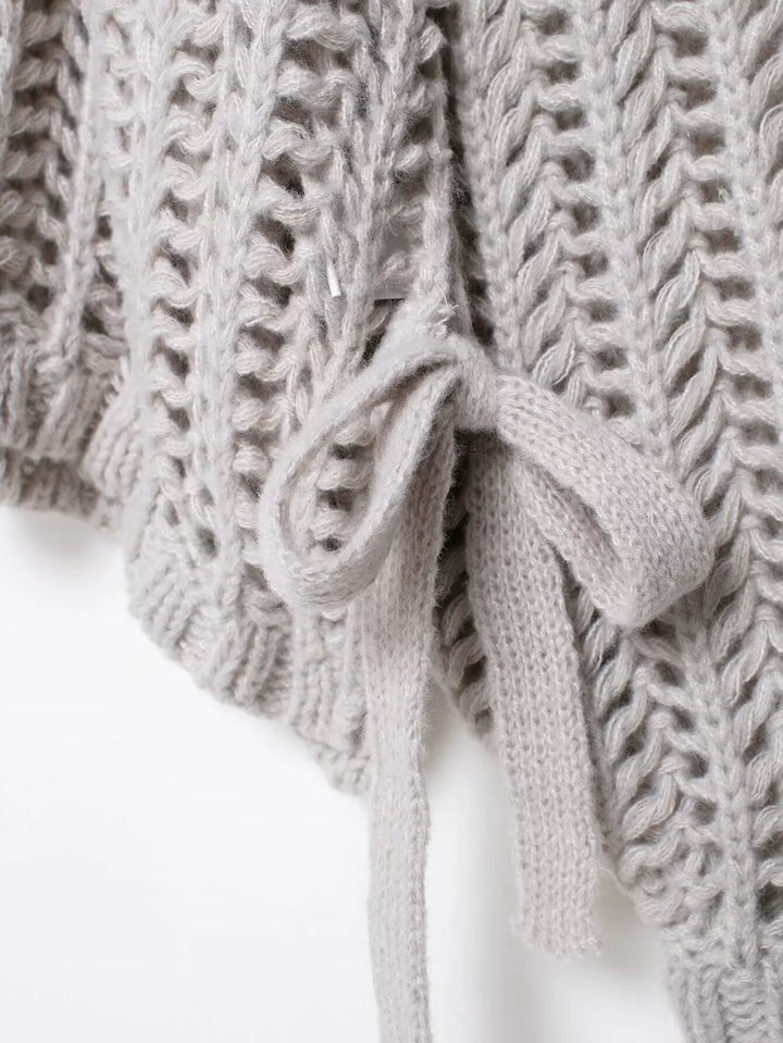 سُترة طويلة الأكمام مع حزام جانبي محبوك