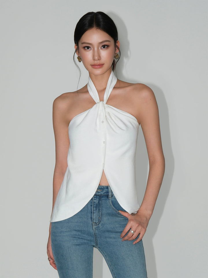 Top in raso con scollatura a halter e spacco attorcigliato