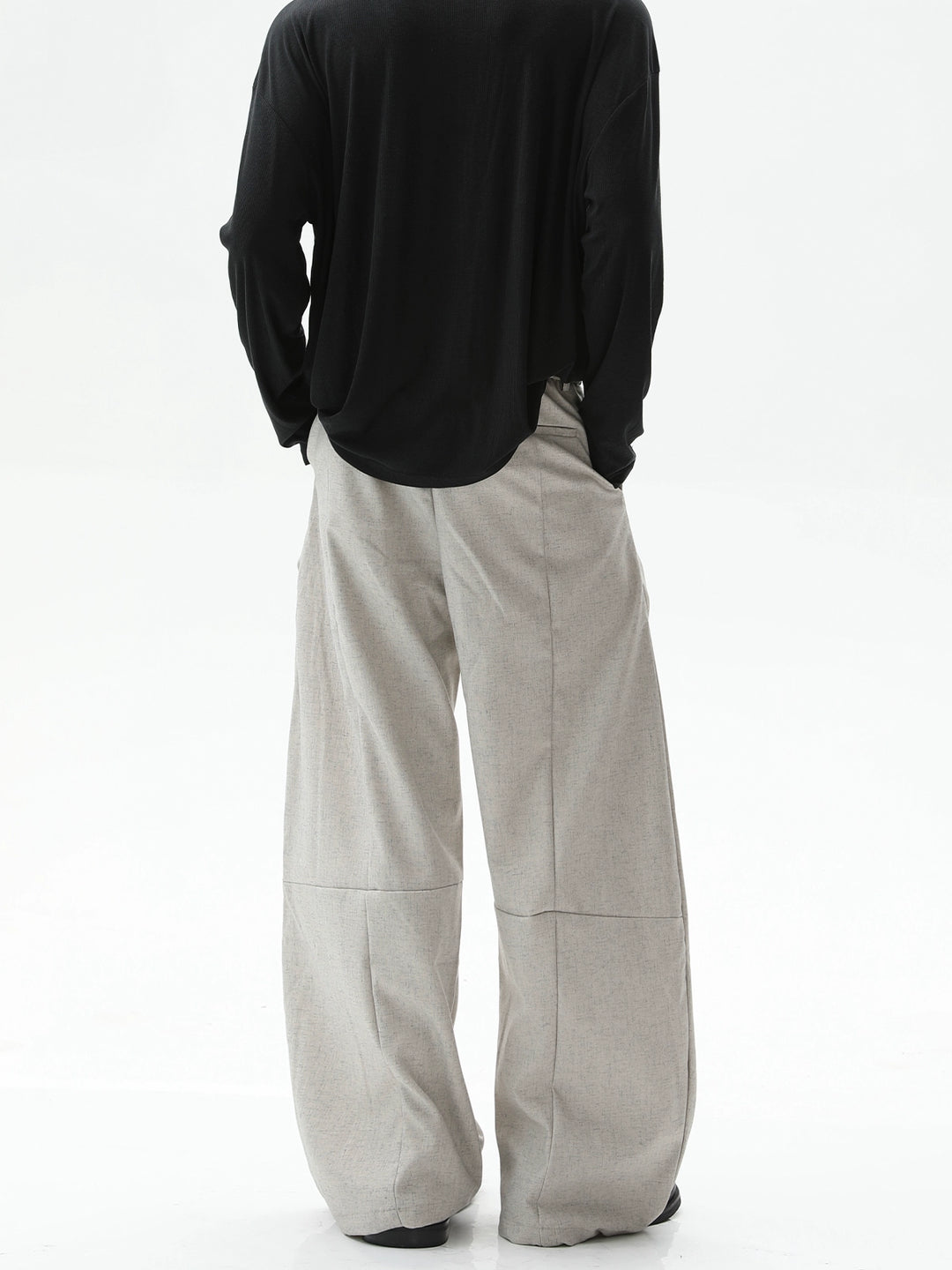 Pantalones casuales de lino con pliegues y pierna ancha