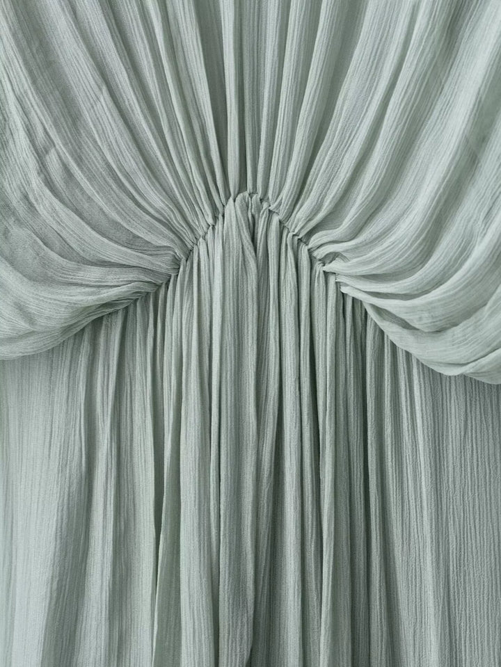 فستان شمس طويل الأكمام بقصة V مطوية