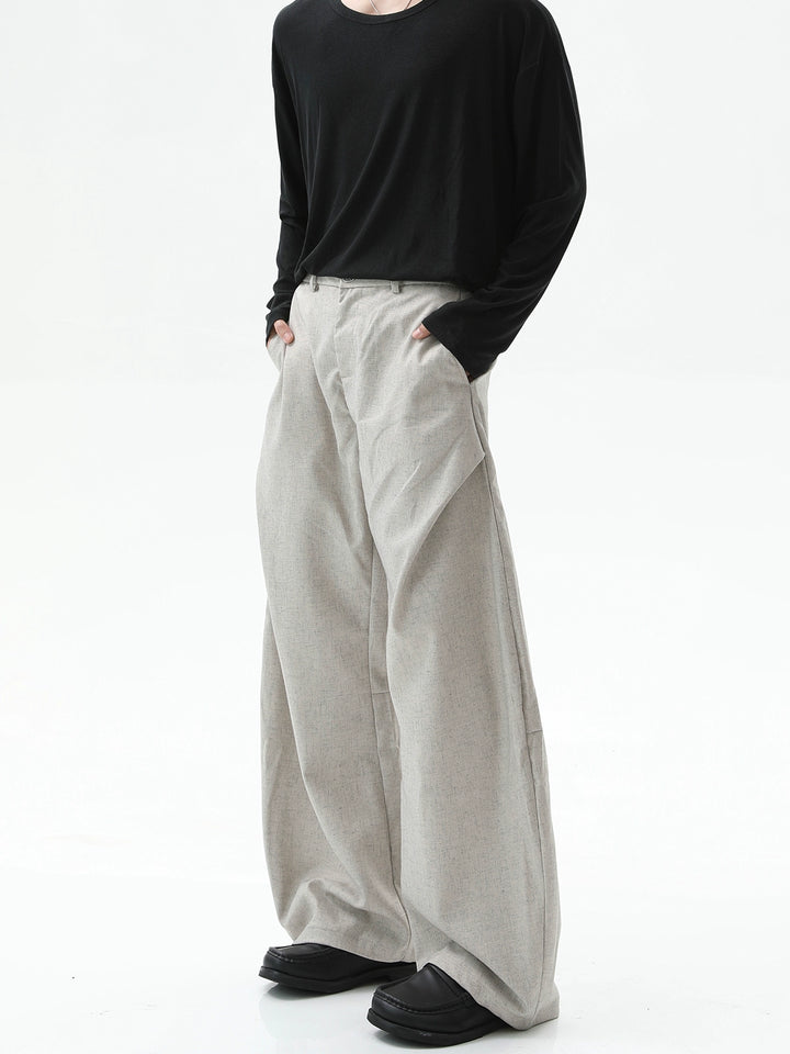 Pantalones casuales de lino con pliegues y pierna ancha