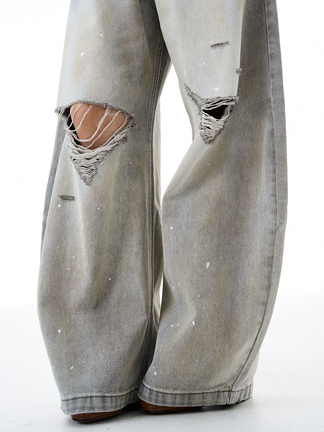 Jeans a gamba larga in denim macchiati d'inchiostro