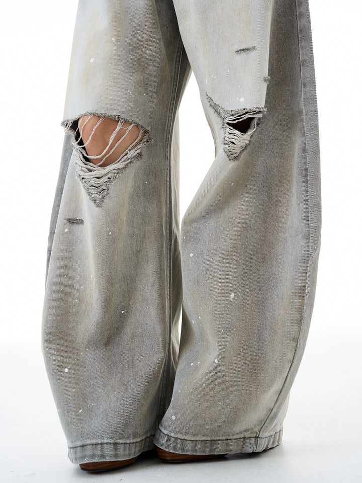 Jeans a gamba larga in denim macchiati d'inchiostro