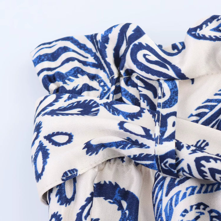 שורטס מודפסים בשקית נייר סטן