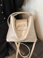 Bow Accent Shiny Leather Handbag
