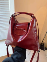 Bow Accent Shiny Leather Handbag