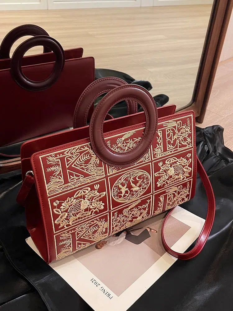 Circular Handles Embroidered Handbag