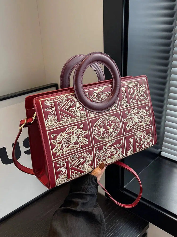 Circular Handles Embroidered Handbag