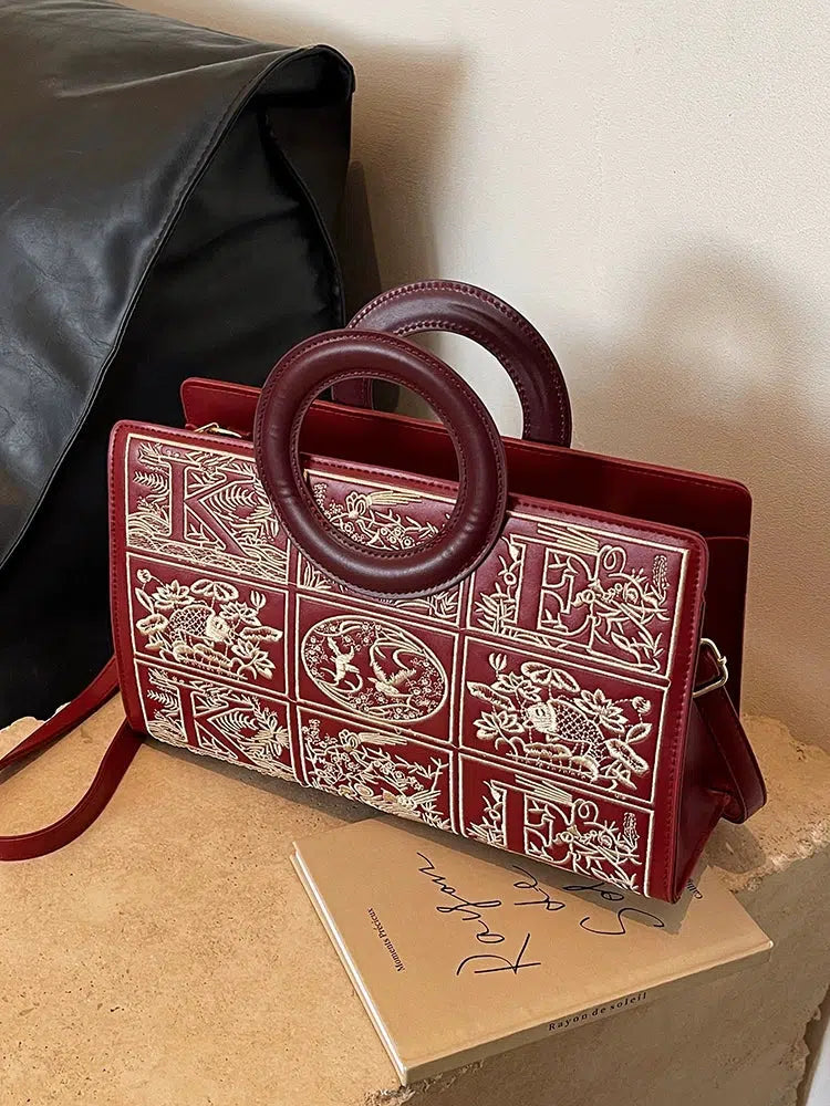 Circular Handles Embroidered Handbag