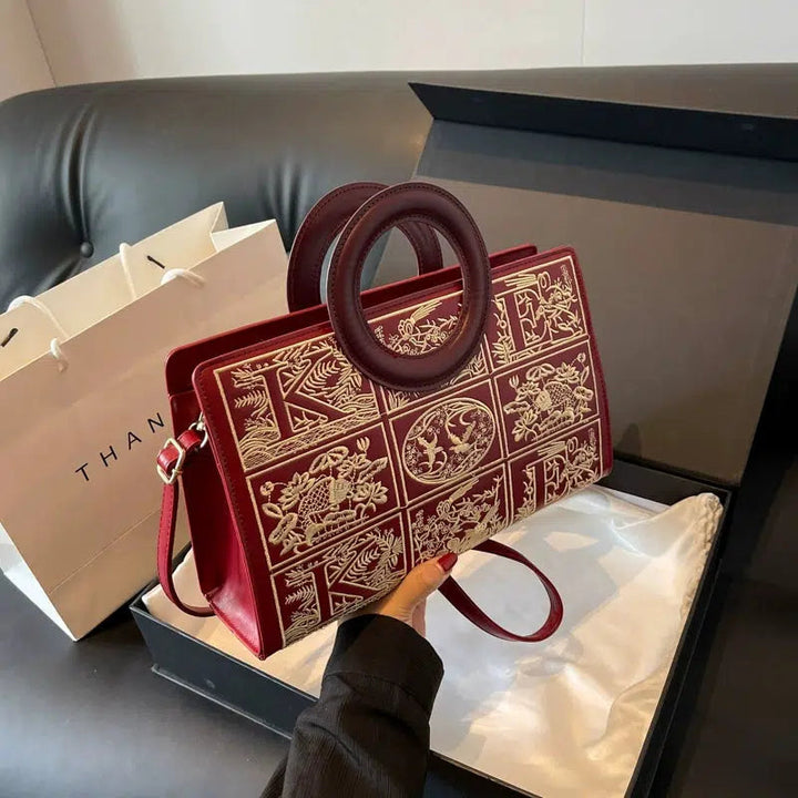 Circular Handles Embroidered Handbag