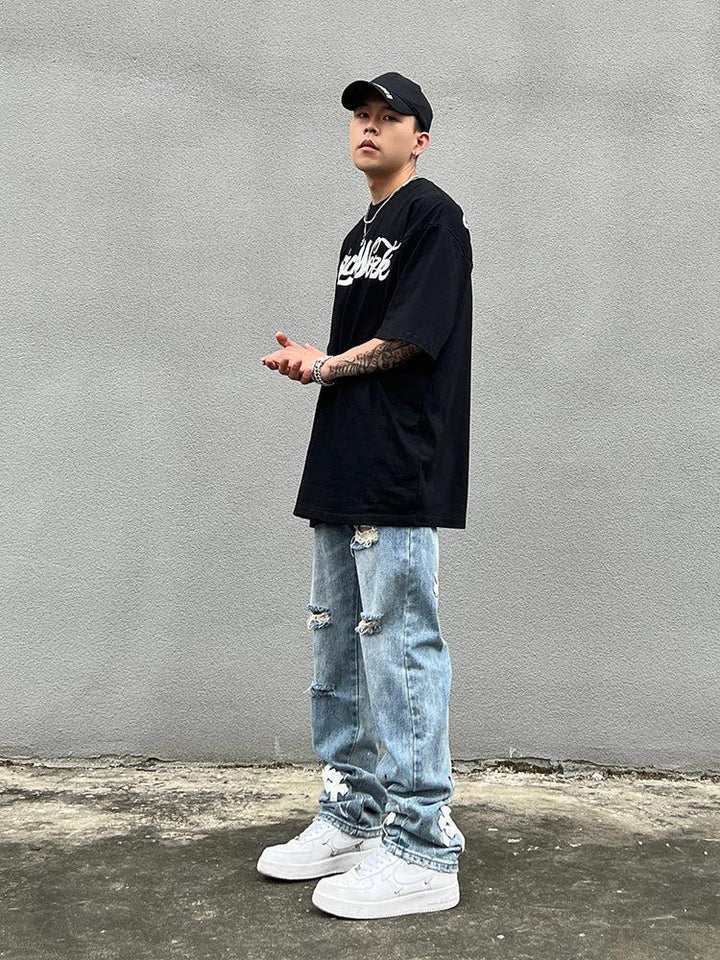 Cross Patch Ripped Jeans