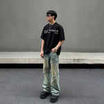 Distressed Wide-Leg Jeans with Pocket Detail