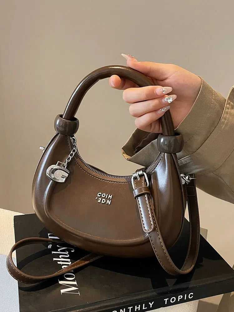 Embossed Logo Charm Shoulder Bag