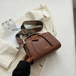 Embossed Strap Leather Handbag