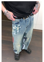 Graffiti Ripped Mopping Jeans