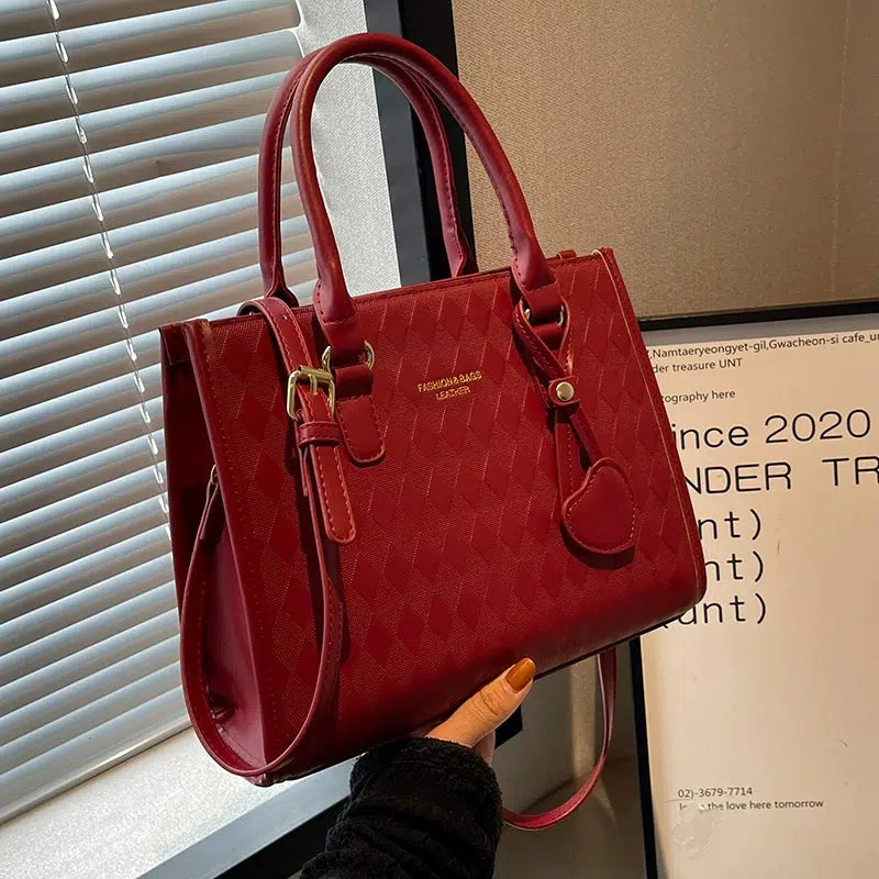 Heart Charm Quilted Leather Tote Bag