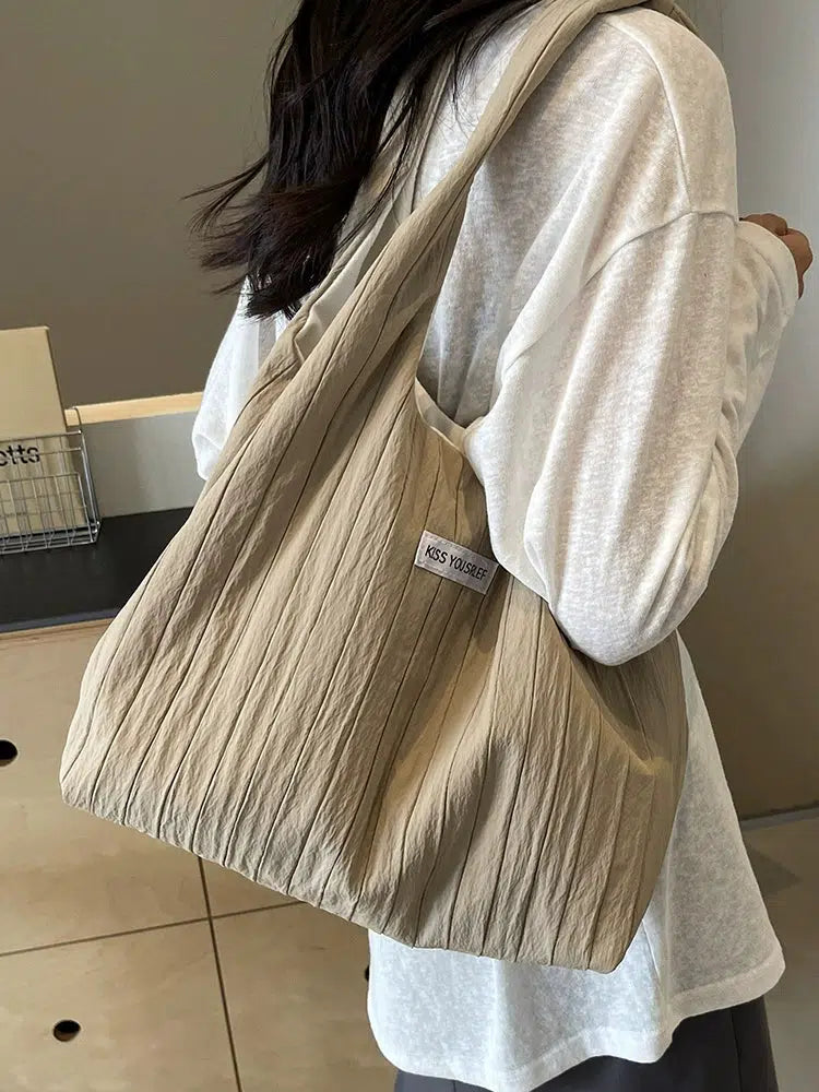 Inscription Quilted Tote Bag