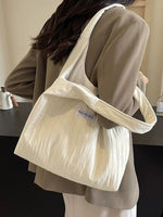 Inscription Quilted Tote Bag