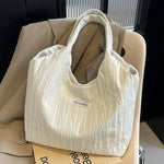 Inscription Quilted Tote Bag