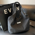 Inscription Quilted Tote Bag