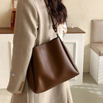Knotted Strap Leather Bucket Shaped Bag