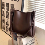 Knotted Strap Leather Bucket Shaped Bag