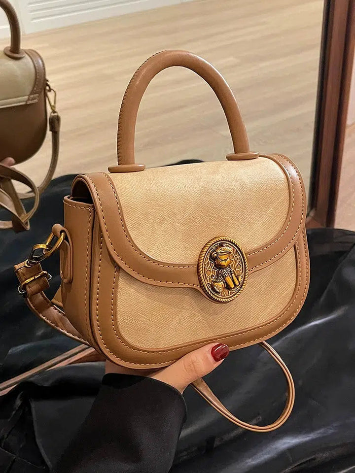 Lion Emblem Leather Crossbody Handbag