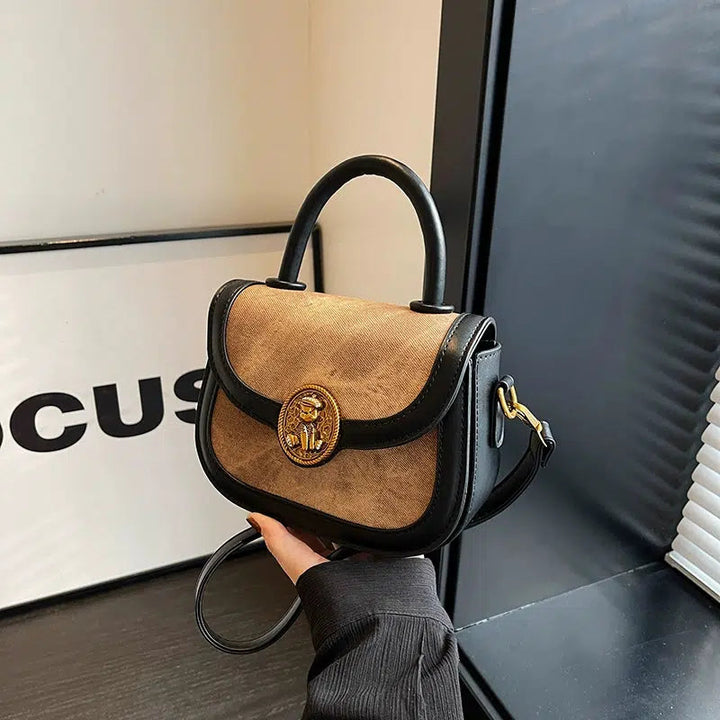 Lion Emblem Leather Crossbody Handbag