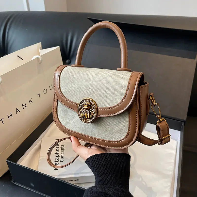 Lion Emblem Leather Crossbody Handbag