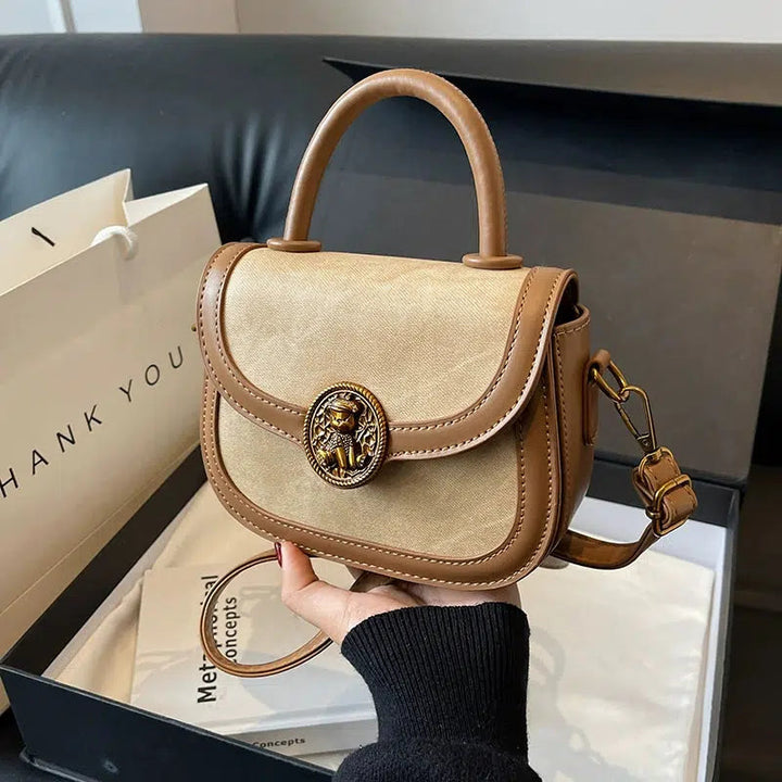 Lion Emblem Leather Crossbody Handbag
