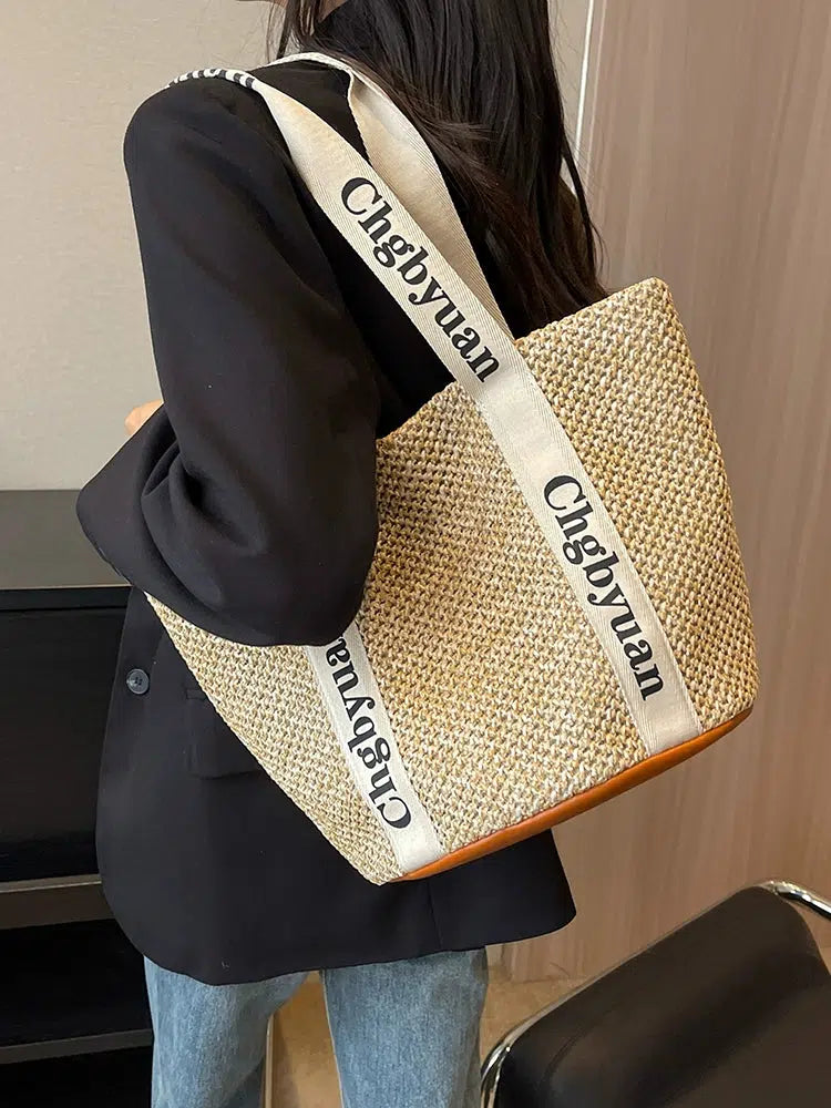 Logo Strap Handwoven Bucket Bag