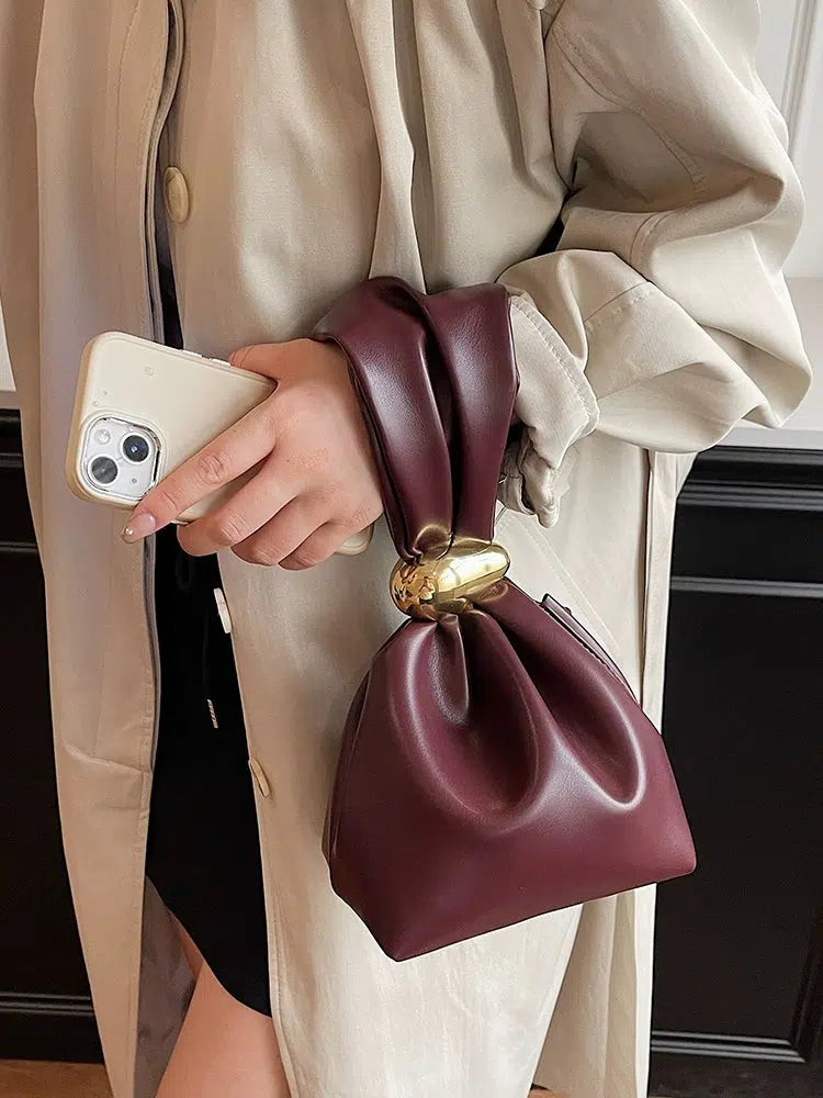 Metallic Accent Knotted Leather Handbag